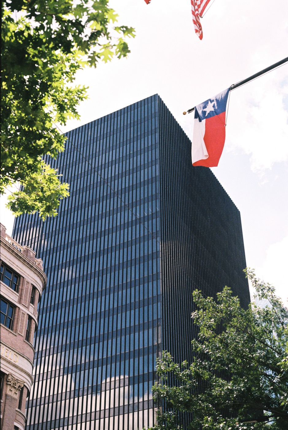 Texas flag outside a commercial office building